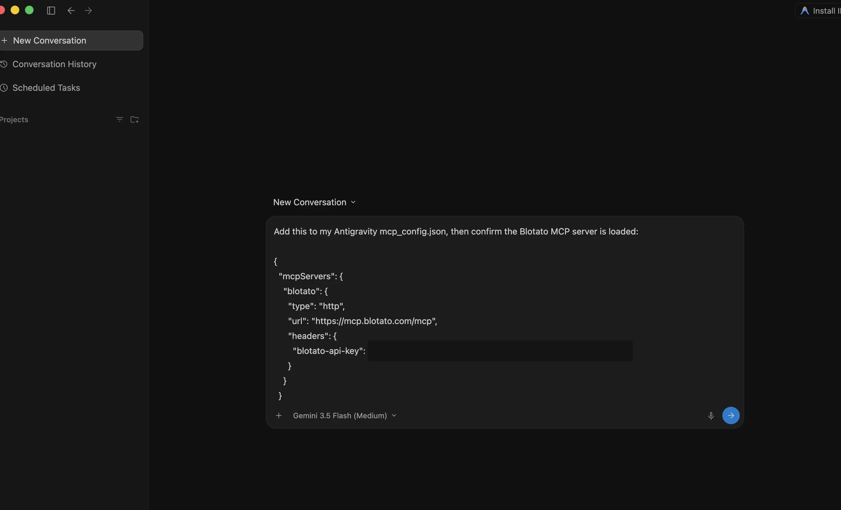 Pasting the Blotato MCP config into Antigravity's Agent pane and asking it to add the server itself