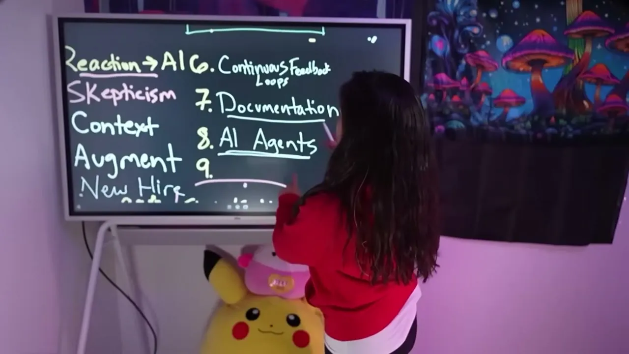 The nine AI skills written on a whiteboard: reaction to AI, skepticism, context, augment, new hire, continuous feedback loops, documentation, AI agents, and building an AI business.